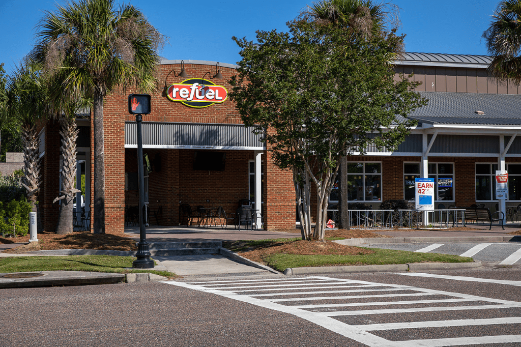 Crosswalk and Refuel store building.