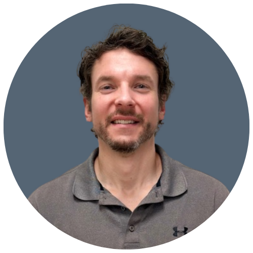 A professional headshot of Chris.